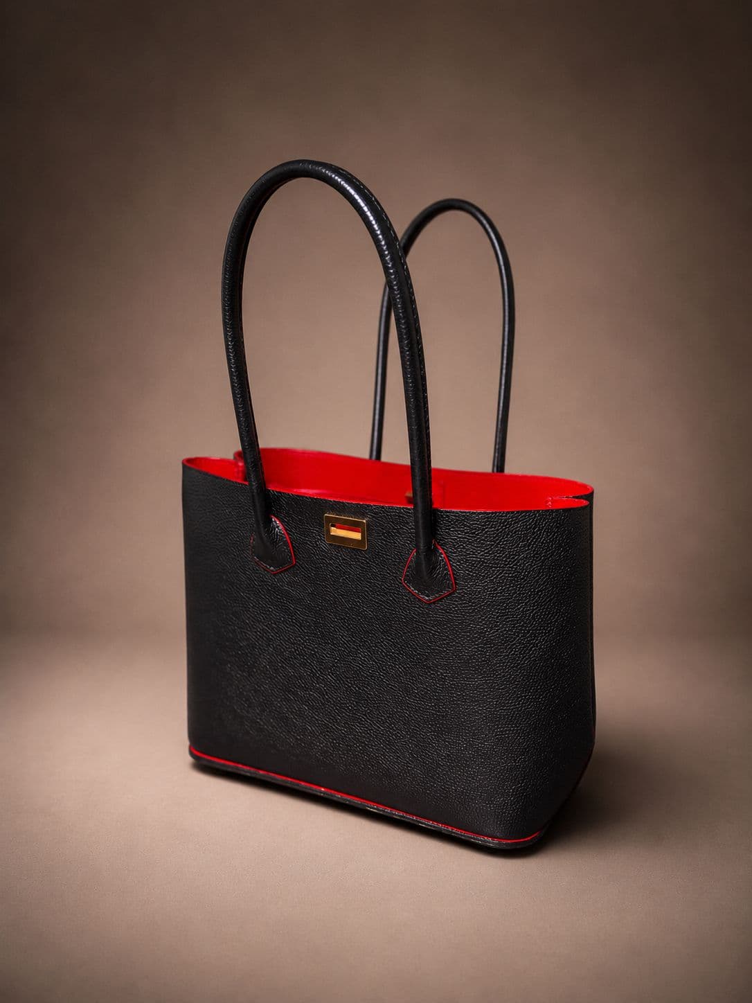 Gichiru Lynn Bag Founders Edition angled open view with obsidian black leather, oxblood lining, and gold hardware